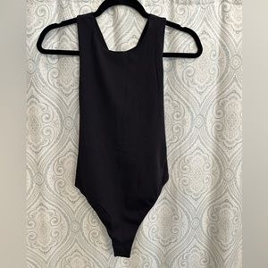 Free People “intimately” cross-cross open back body suit